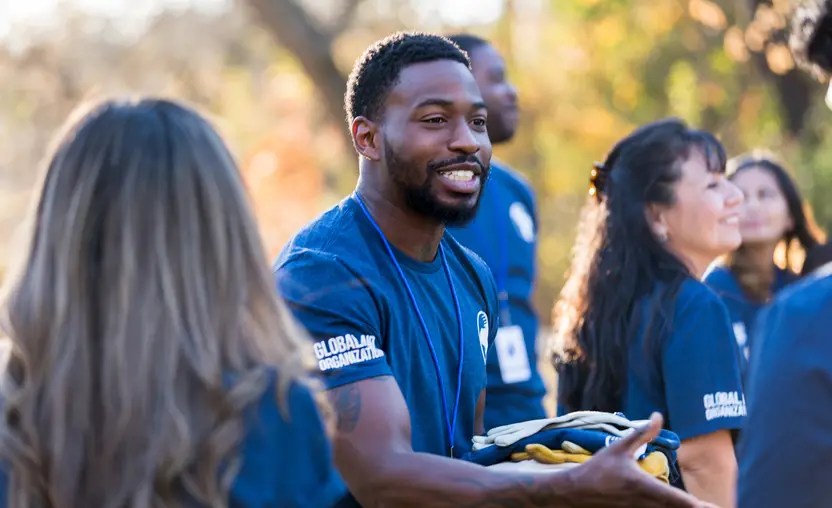 Community service volunteers distributing food